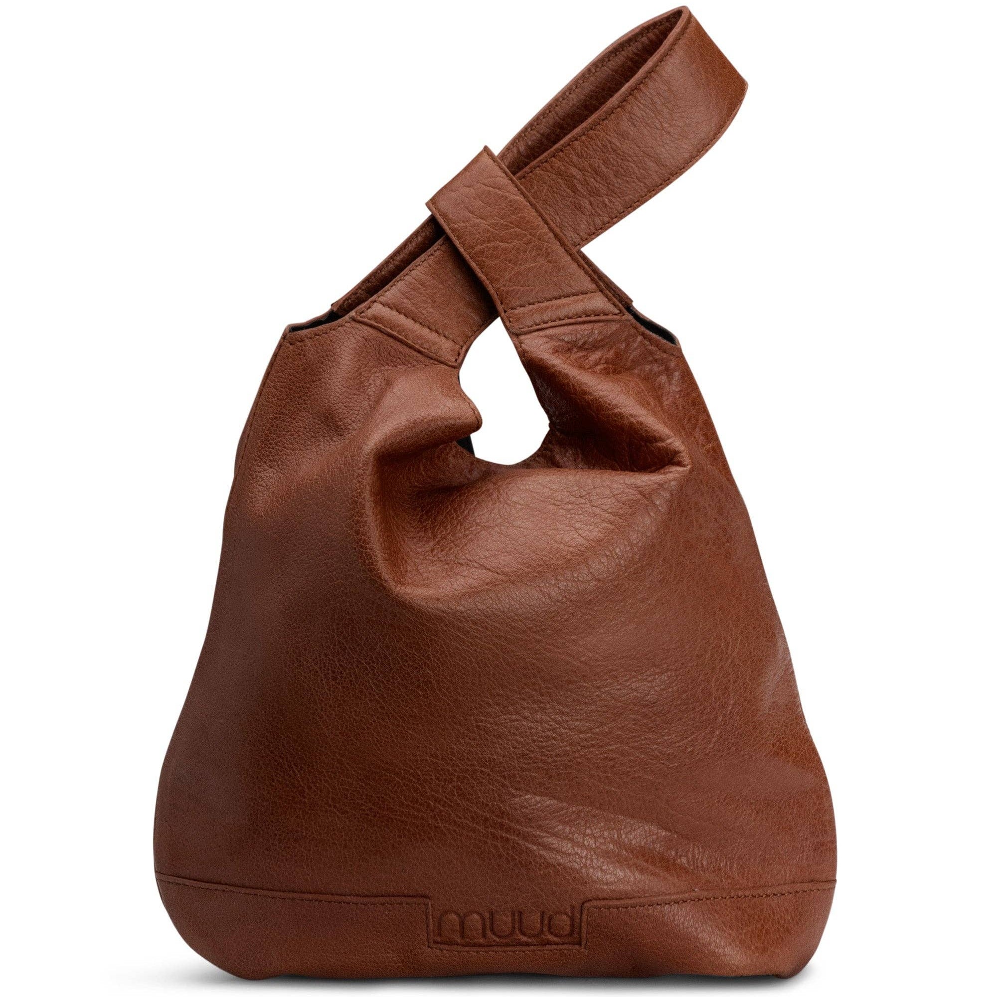 Brown leather handbag on a white background