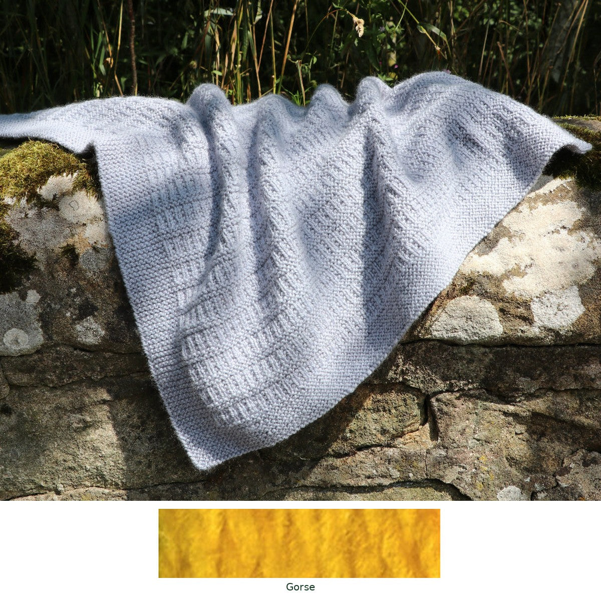Cassillis Baby Blanket knitting kit in Gorse, with the yarn shade shown
