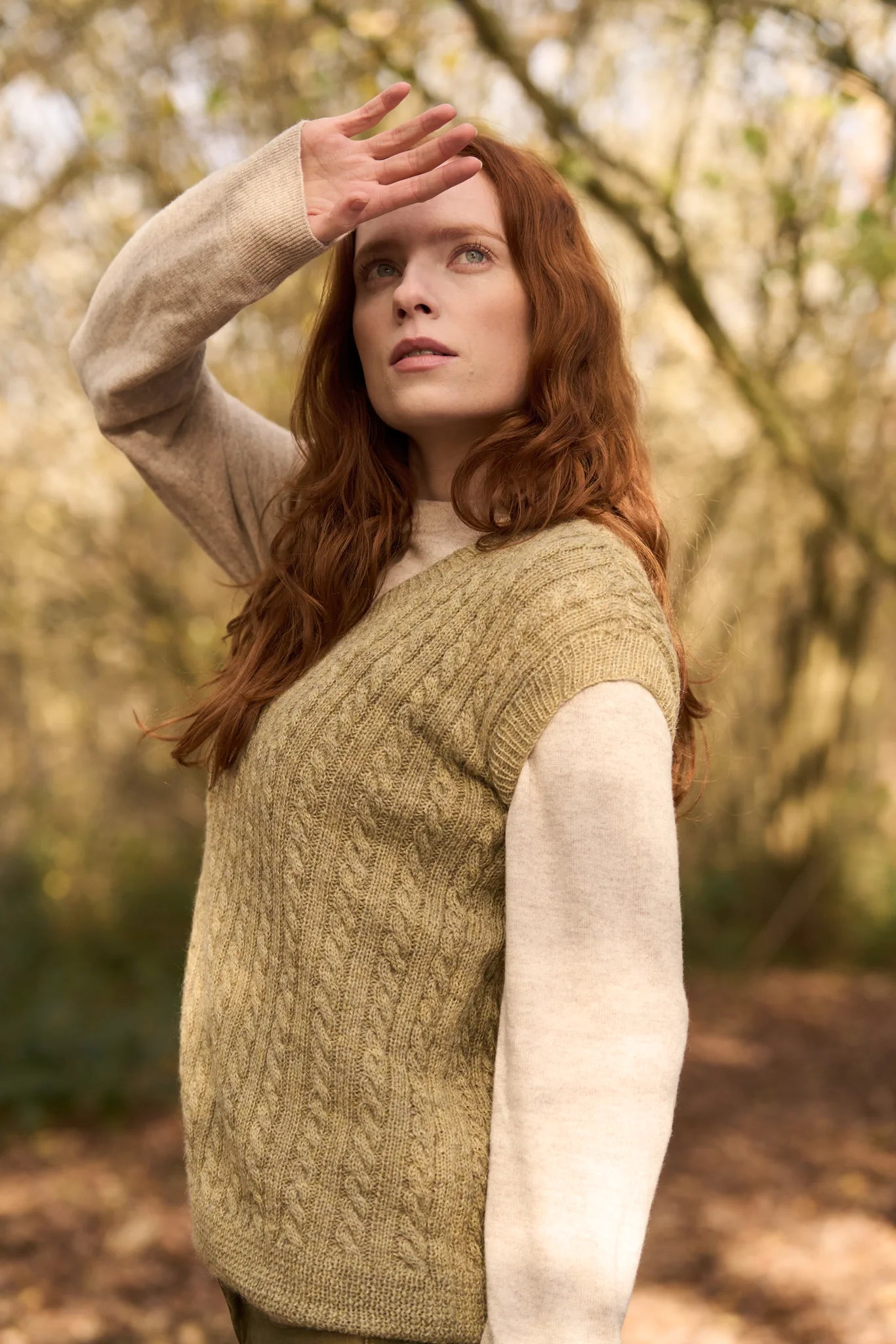 The Bramble & Fleece Settle Tank, a cabled V-neck slipover in Sheepsoft 4 Ply