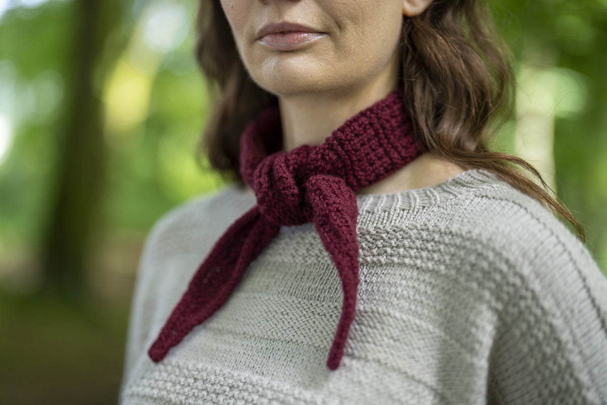 The Cassilis Scarf knitted in Orry Yarn Merino DK, showing the angled shaping and ridged texture.