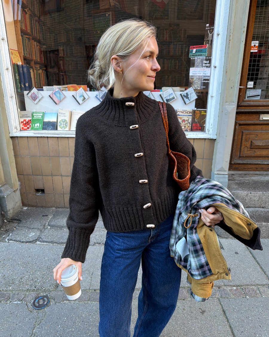 Woman wearing the brown PetiteKnit Hannah Jacket