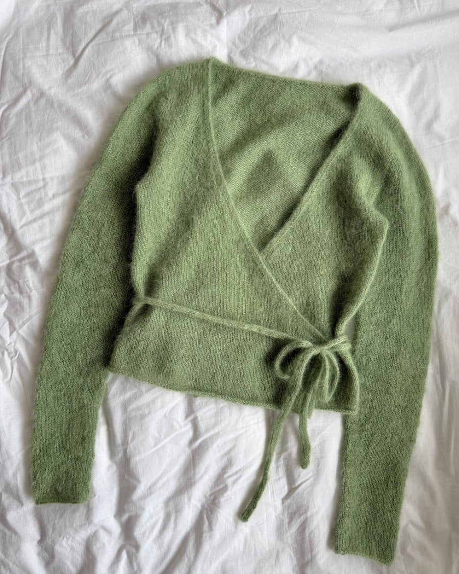 Green PetiteKnit Lucy Wrap laid flat
